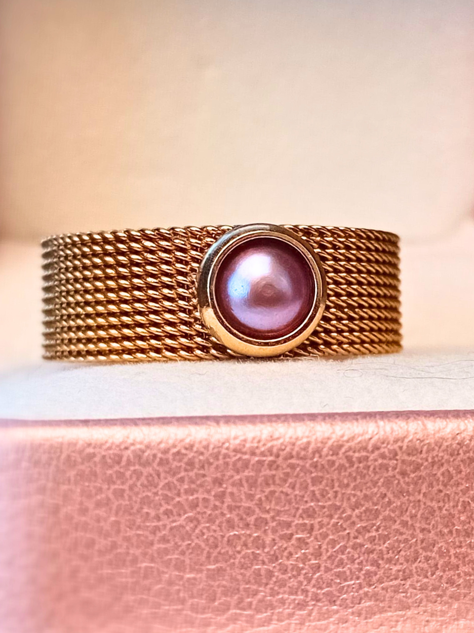 stainless steel mesh ring with freshwater pearl
mesh ring in stainless steel with pearl detail
minimalist pearl ring in stainless steel
freshwater pearl ring with mesh band
modern stainless steel ring with freshwater pearl