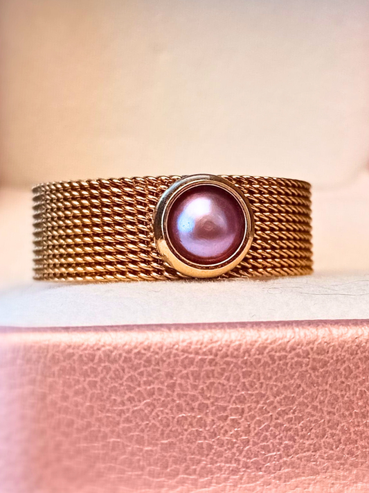 stainless steel mesh ring with freshwater pearl
mesh ring in stainless steel with pearl detail
minimalist pearl ring in stainless steel
freshwater pearl ring with mesh band
modern stainless steel ring with freshwater pearl